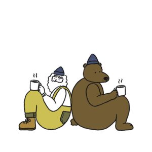 コーヒーを飲みながらくつろぐひげのおじさんと熊